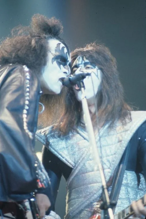 Gene Simmons and Ace Frehley of KISS on stage in face paint, 1978
